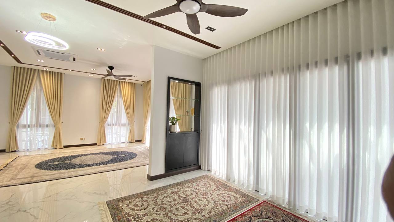 Full-height S-Fold curtains creating a luxurious feel